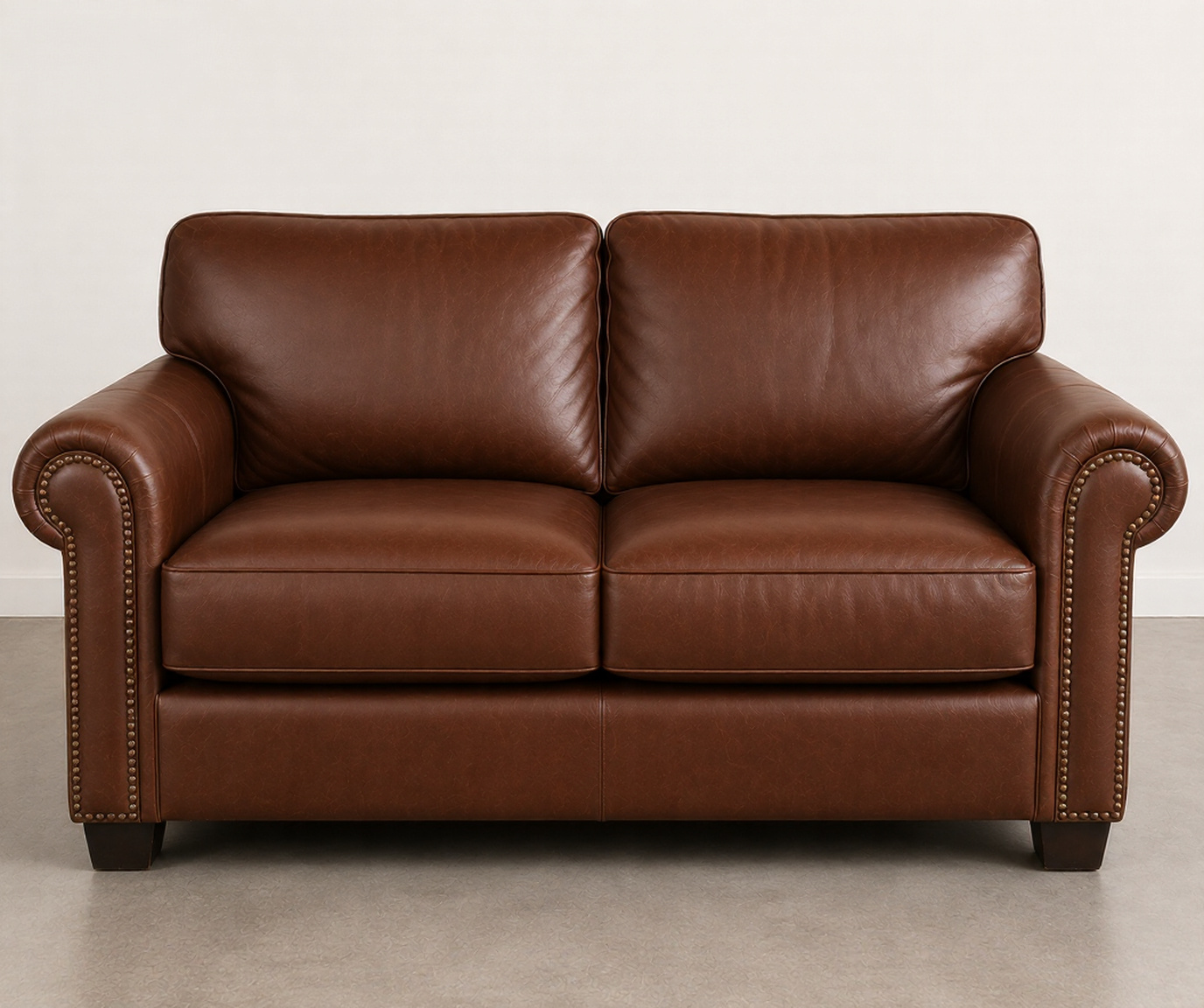 Completely restored sofa with new premium leather finish and firm, modern-looking cushions